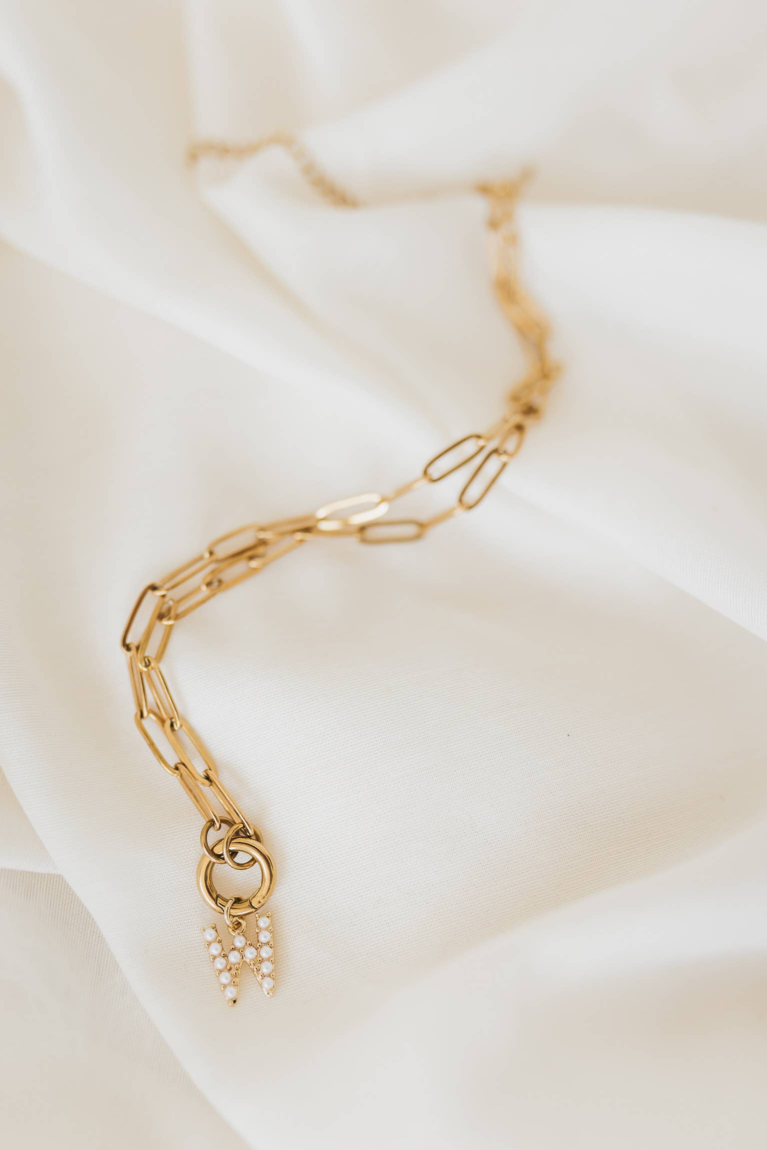 The Charm Keeper – Pearl Letter Edition: I